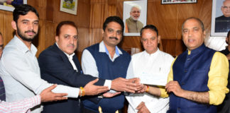 IPH MINISTER PRESENTS A CHEQUE OF RS. 5 LAKH TOWARDS CMRF