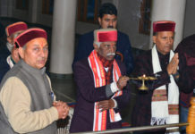 Governor takes religious bath in Tattapani on the eve of Sakranti