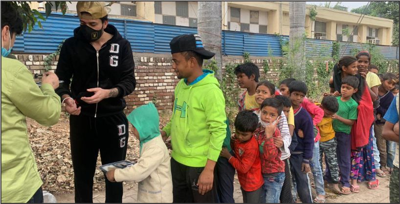 Provide Relief to Needy in Pandemic, Entrepreneur Distributes Meals to Kids